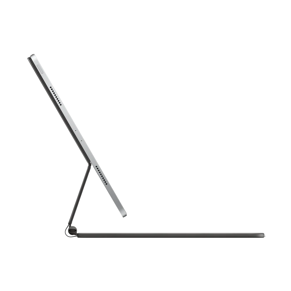 Side-profile shot of Apple Magic keyboard in silver, attached to iPad