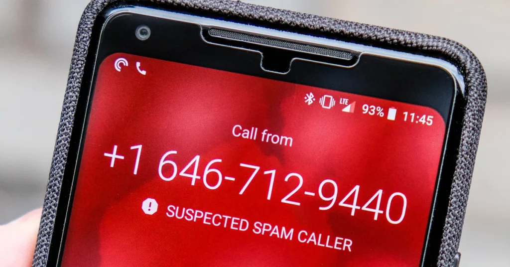 Close up shot of smartphone with suspected spam caller warning