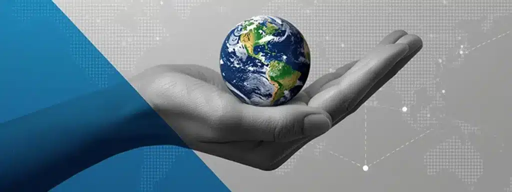 Woman's hand holding up Earth with all countries in background for international communication