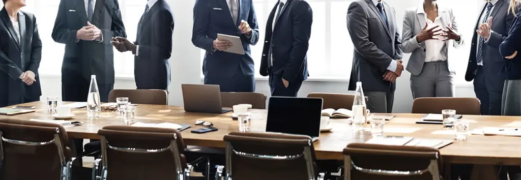Group of office workers having a business meeting in a conference room